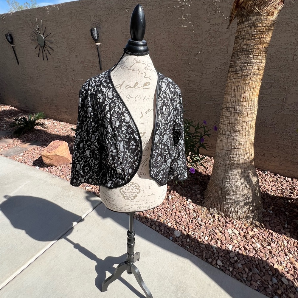 New jacket with lace detail.
